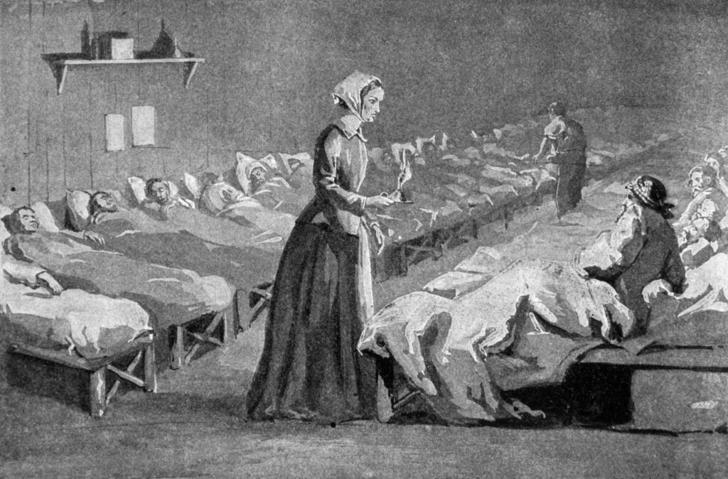 Florence Nightingale caring for soldiers with her lamp during the Crimean War, symbolizing the birth of modern nursing.